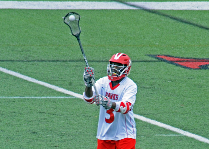 LaDarius Williams set Huntingdon's single-game record for goals with 11 in Wednesday's 20-2 win over the University of Dallas. The Hawks set four team and individual records in the game. (Photo by Wesley Lyle)