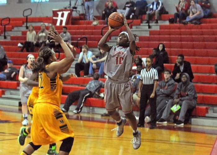 Pat Pickens, shown here against Methodist, had 21 points and 17 rebounds in Sunday's 55-47 win over William Peace. With 1,299 career points, Pickens moved into second place on the Lady Hawks' NCAA-era career scoring list. (Photo by Wesley Lyle)