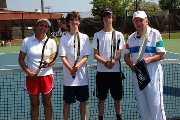 After 19 months away from the tennis courts due to health issues, John McWilliams, U.S.P.T.A., recently joined Huntingdon women&rsquo;s tennis coach Ximena Moore in giving a lesson to the Ramsey twins, Hawthorne and J.B.